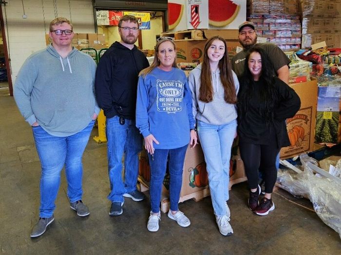 Book Systems food drive community involvement